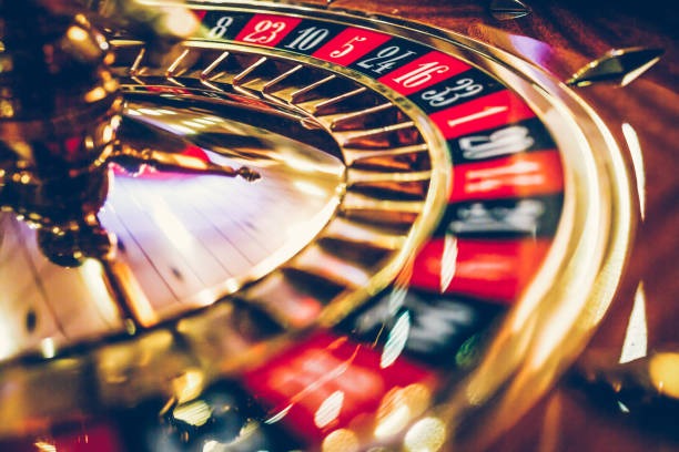 Captain's Bounty slot game interface on aloft showing reels, symbols, and football tournament theme